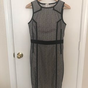 100% Polyester above knee length cocktail dress.